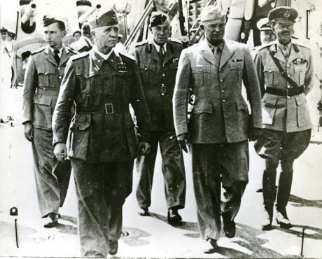 Italian PM Field marshal Badoglio and General Eisenhower walking along the deck of the battleship Nelson in Malta, few moments before signing the final document of Italian surrender to the Allies, September 29, 1943